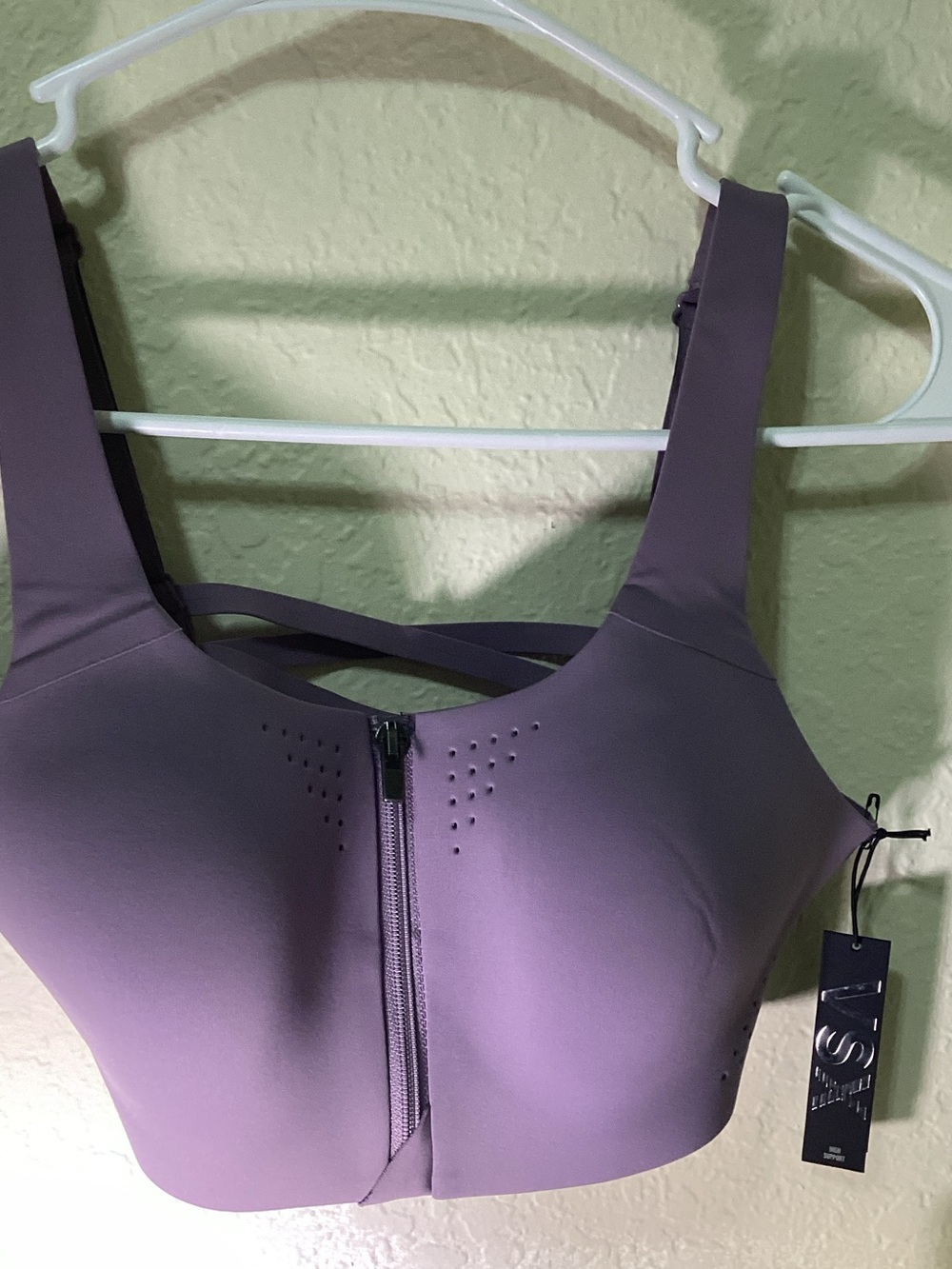 Victoria's Secret mauve front-zip sports bra with crisscross back